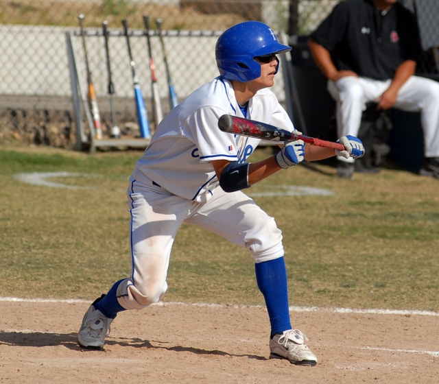 Jonathon Magana shows a bunt during last Friday’s game against Santa Paula.