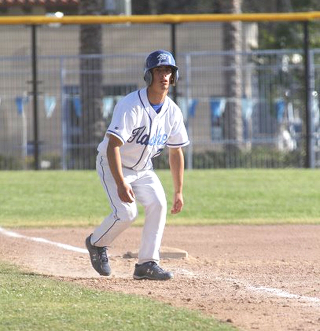 Nick Paz takes a lead off of third base against Santa Paula, last Friday. Going into the 7th inning tied 6-6, Fillmore lost 13-6.