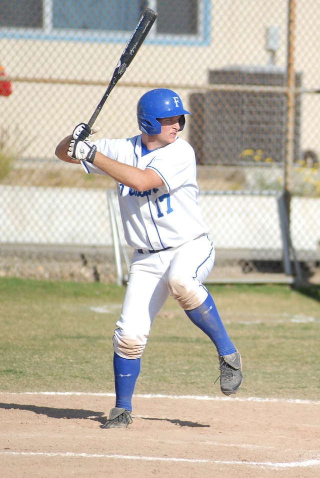 Tanner Carpenter waiting for the pitch in the game against Bishop Diego.