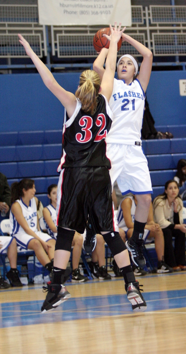 Rebecca Herrera jumps past Harts defense and makes the basket. Fillmore beat Hart 57-48
last Thursday January 8th.