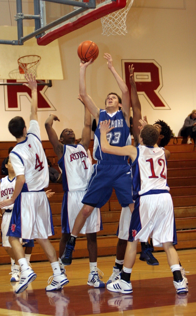 Noah Aguirre jumps through the defense for a basket. San Marcos defeated Fillmore. (Photos by David Watson)