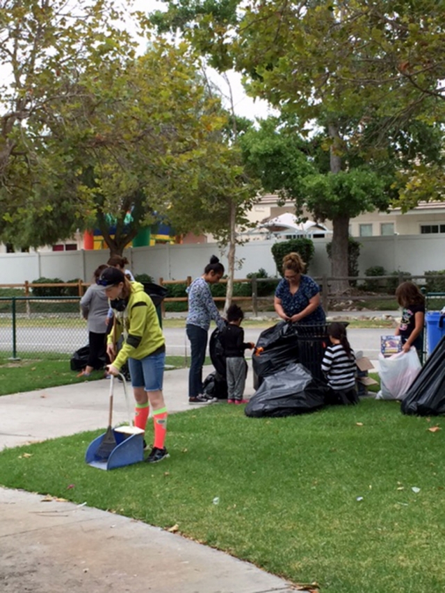 SoCal Bears Cheer would like to thank all who supported their organization by purchasing fireworks at their booth this year. (above & below) Girls showing their community spirit early Sunday morning, July 5, cleaning all the debris from Doris Day Park. Photo by R. Andrino 
