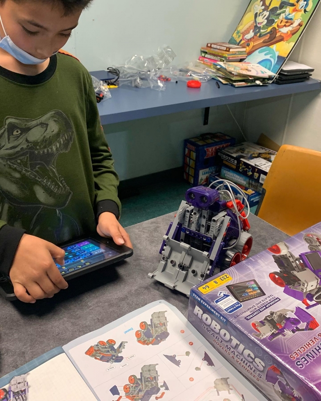 Friday Robotics Fun! Students put together Mechanical Engineering Rovers & Vehicles as part of Robotics Day this past Friday at the Boys and Girls Club in both Fillmore and Piru Clubhouses. Pictured are two kids looking over directions as the work to put together their robot vehicles. Photos courtesy https://www.facebook.com/bgclubscv