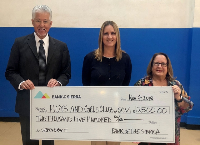 Pictured (l-r) are Don Tello, Branch Manager of Bank of the Sierra Santa Paula and Tracy Grove, Operations Manager, presenting a check for $2,500 to Boys & Girls Club of Santa Clara Valley CEO, Jan Marholin. The grant will support the award-winning After School STEM Academy at club locations in Fillmore, Piru and Santa Paula. This grant will allow local youth continued participation in STEM activities such as 3D Printing, Robotics and Green Screen technology. Submitted by Jenae Quintana and Photo courtesy Pearl Galvan.