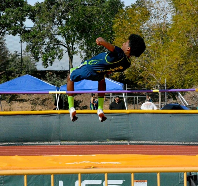 Heritage Valley Blazer Dante Mata breaking a 2012 record in
High Jump by 4, leaping 6'-0. Photo and Story Courtesy of
Erika Arana