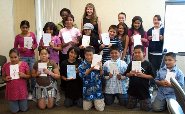 On Wednesday, May 13, the student authors from San Cayetano presented their books to the Ventura County Medical
Center in Fillmore. The project was funded by Bill Herrera and State Farm. This is the third year of San Cayetano’s service learning project coordinated by Jan Marholin, Principal; Sheila Duckett and Debbie Blaylock, Computer Lab Coordinators.

The students, in no particular order, are: Liz Ocampo, D.J. Hernandez, Marion Fernandez, Katelyn Alverdi, Jasmin Morales, Daisy Romero, Cris Candelario, Anabel Herrera, Anthony Morales, Madison Herrera, Angelica Rivas, Fernando Pizano, Drew Davidson, Adrian Casas, Raul Mejia and Katrina Cisneros.