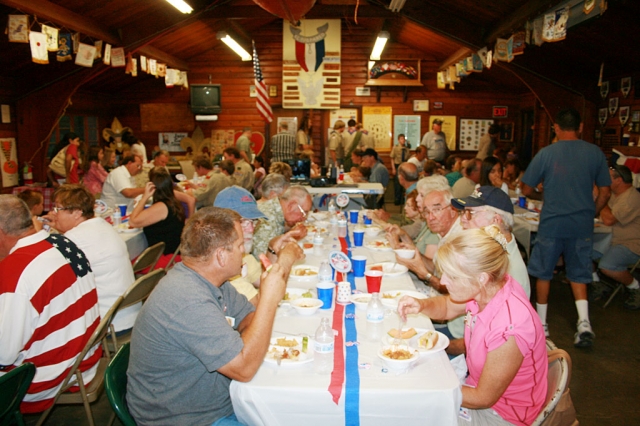 Many special guests enjoy the Centennial Dinner at the Scout House.