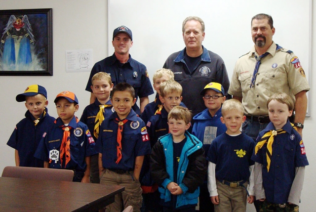 Tiger and Wolf Cubs of Pack 3400 are pictured above with Fillmore Fire Station. Captain Bob Thompson on their recent visit.
