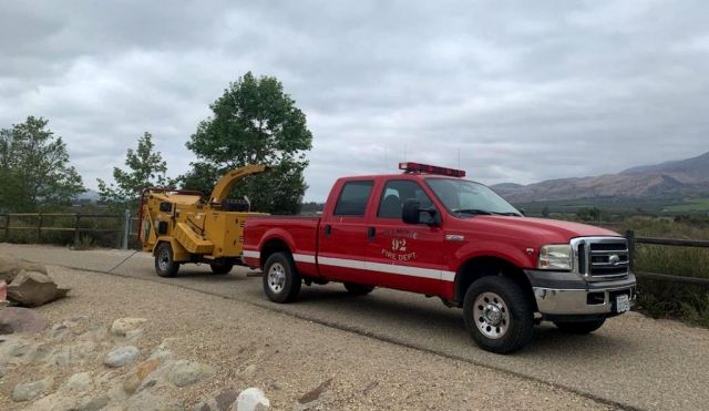 Fillmore City Fire crews were out working on local bike paths, clearing away overgrown brush last weekend. Pictured is one of the vehicles pulling a woodchipper.