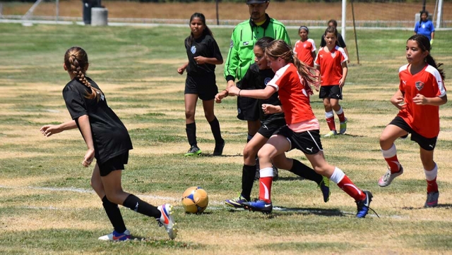 Jessica Rodriguez in a tough battle for the ball versus Valley United on Saturday July 1st. All photos Courtesy Evelia Hernandez.