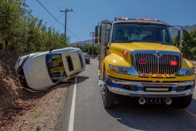On Monday, July 4th, 2022, at 2:59pm, California Highway Patrol, Ventura County Fire Department and AMR Paramedics were dispatch to a reported traffic collision in the 1500 Block of Sycamore Drive, Fillmore. Arriving firefighters reported a single vehicle on its side with no occupants inside. The occupant had possibly fled the scene; fire crews were checking the area to locate the driver who was not found. No other additional information was provided at the time of the scene. Cause of the crash is under investigation. Photo credit Angel Esquivel-AE News.