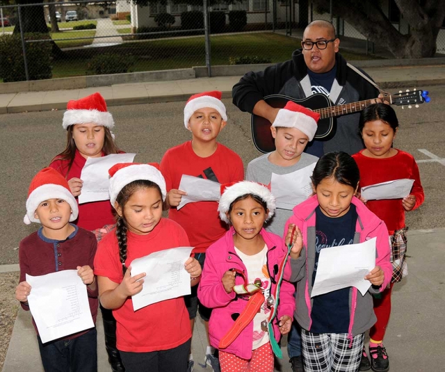 On Thursday, December 21st carolers from the Fillmore Boys and Girls Club stopped by the Fillmore Gazette and sang some Christmas Carols to the staff. The group walked up and down the main streets of Fillmore visiting local businesses and singing Christmas Carols to spread the Christmas spirit.