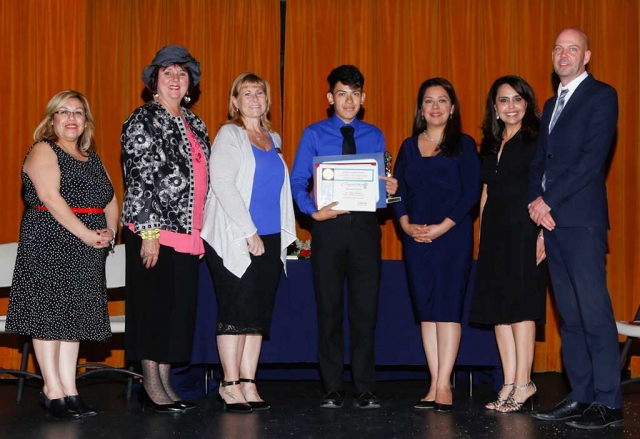 Student of the Year Mizael Ponce, center.