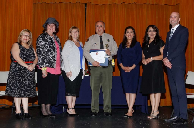 Citizen of the Year Leo Vazquez, pictured center.