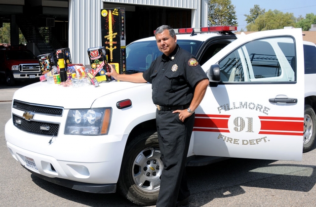 Fillmore Fire Chief Rigo Landeros stands by illegal fireworks that were confiscated last week. The fine for illegal fireworks is $1,100.