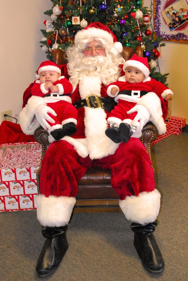 The police storefront held Tuesday, December 21st, was a huge success again this year. Santa Claus was kind enough to come by and bring lots of toys and joy to the little ones. Shown on Santa’s lap are cousins Anthony Magana and Saul Magana doing their best Santa imitations. 1,100 coats and toys were handed out to 1,439 kids from 358 families. The Fillmore Fire Department gave out 60 turkeys. Each child who sat on Santa’s lap received a free Polaroid of the moment along with a candy cane.