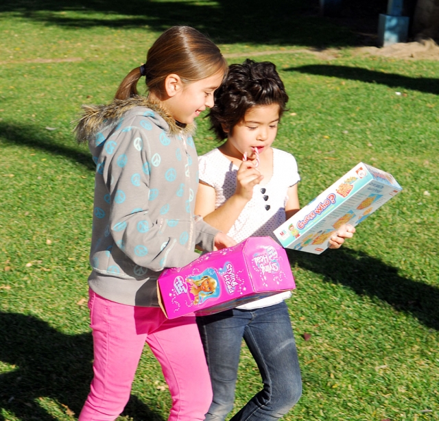 Two San Cayetano students excited about their presents.
