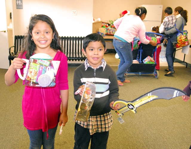 Happy faces and joyful hearts is what the Storefront Christmas program is all about.