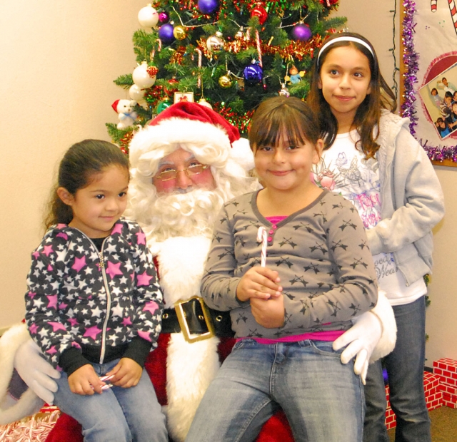 Everyone had their picture taken with Santa and received a candy cane.