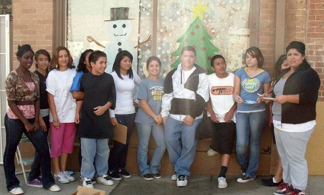 Members of Piru's Making A Difference Youth (MAD Youth) show off their talents as they decorate downtown district storefronts in preparation of the 32nd Annual Piru Christmas Parade and Festival. This always popular and well-attended celebration is set for Saturday, December 12th at noon. This year the theme is 