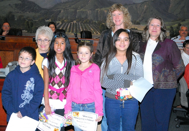 Pictured (l-r) Sammy Estrada, Mrs. Dressler, Perla Chavez Hernandez, Taylor Wright, Destiny Alonzo, Cindy Klittich, and Mayor Patti Walker. The children above are the winners of the essay contest sponsored by the Fillmore Civic Pride Committee.