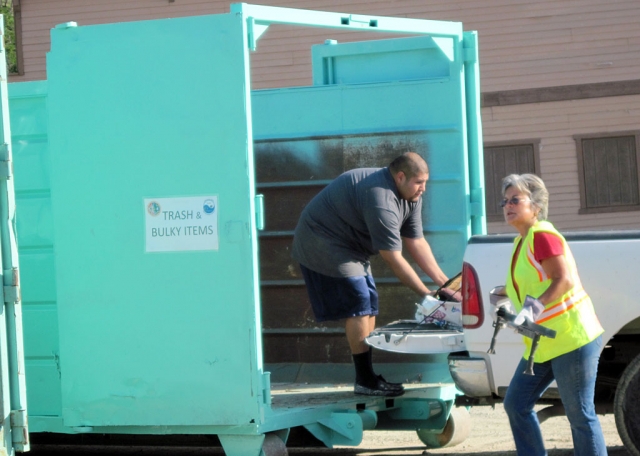 Friends and county workers pitch in.