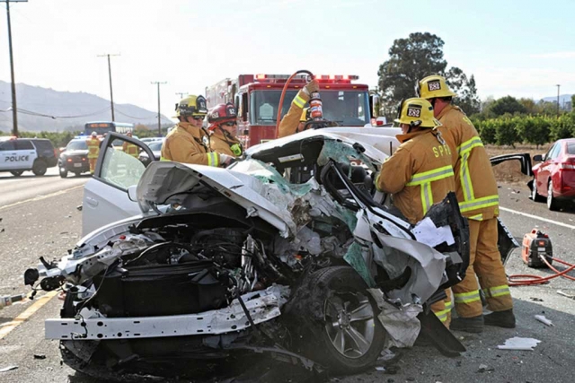 A traffic accident involving four vehicles took place on Wednesday, December 2, 2015 at Highway 126 and between Hobson and Boosey Roads.One person was killed, at least one injured. At 1:50pm one of the vehicles in the westbound lane veered into eastbound traffic, hitting another vehicle head-on. The collision caused first vehicle to veer back in to the westbound lanes, striking two other vehicles. The male drive of the westbound vehicle was pronounced dead at the scene. Fillmore Fire, Santa Paula Fire and Ventura County Fire responded to the accident. Photos by Sebastian Ramirez.