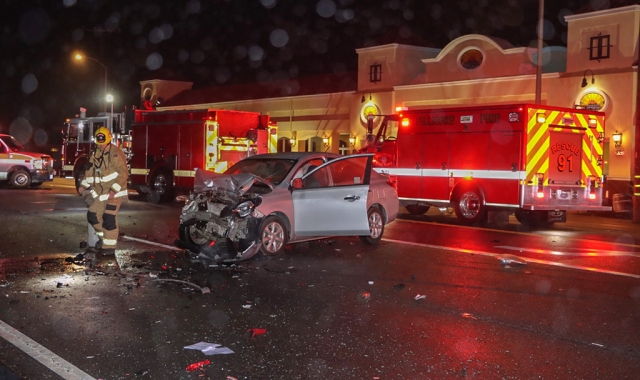 On Friday, December 30th, 2022, at 7:40pm, Fillmore Police, Fillmore Fire Department, Ventura County Fire Dept., AMR Paramedics and an AMR Supervisor were dispatched to a 3-car traffic collision in front of El Pescador (Ventura St. / D St.), Fillmore. Arriving paramedics reported several vehicles involved with three patients declining treatment, four patients transported to
a local hospital, and an injured animal. Both eastbound lanes of Ventura St./SR-126 were closed, with traffic directed to River and E Street. Deputies performed a sobriety test on one of the occupants of the vehicle. It is unknown if any arrests were made; the collision is under investigation by Fillmore Police Department. Heavy rains may have been a factor in the crash. Photo credit Angel Esquivel-AE News.