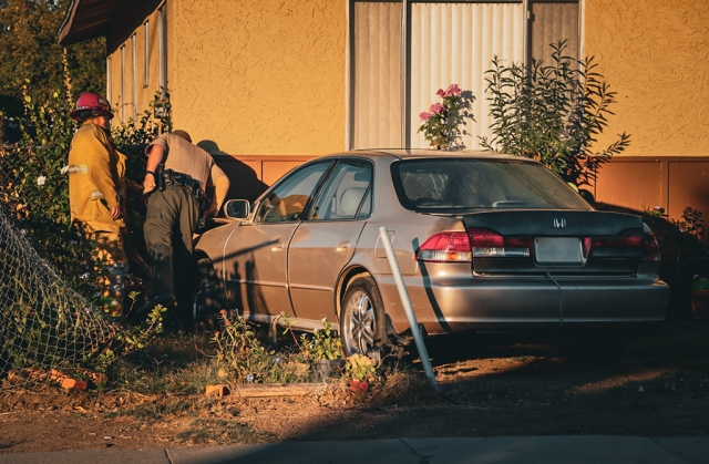 On Tuesday, October 18th, 2022, at 7:34am, Fillmore Police, Fillmore Fire, and AMR Paramedics were dispatched to a reported vehicle accident in the 800 block of A Street, Fillmore. A single vehicle was reported inside a residence yard with minor damage. The cause is under investigation. Photo credit Angel Esquivel-AE News.