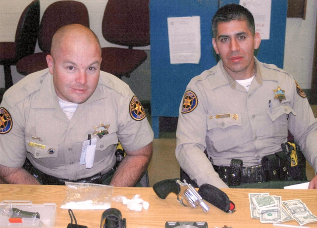 Above are some of the guns and drug paraphenalia recovered in the Santa Paula raid conducted on January 5th, 2010.