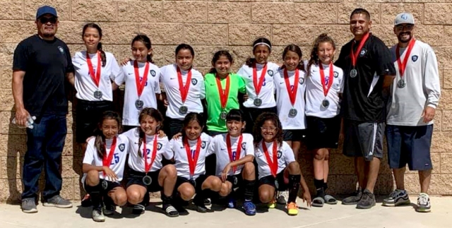 Pictured above is Fillmore’s California United FC 2008 Girls Blue Team who placed 2nd in California United’s first Friendly Tournament held this past weekend in Fillmore at Two River’s Park, August 10th and 11th. Top row left to right: Assistant Coach Aciano Mendez, Lizbeth Mendez, Alondra Leon, Anel Castillo, Delila Ramirez, Valerie Rubio, Nathalia Orosco, Jazleen Vaca, Head Coach David Vaca, and Assistant Coach John Cabral. Bottom row left to right: Danna Castillo, Leanna Villa, Sara Diaz, Fiona Cabral and Joelle Rodriguez. Photo courtesy Nancy Vaca.