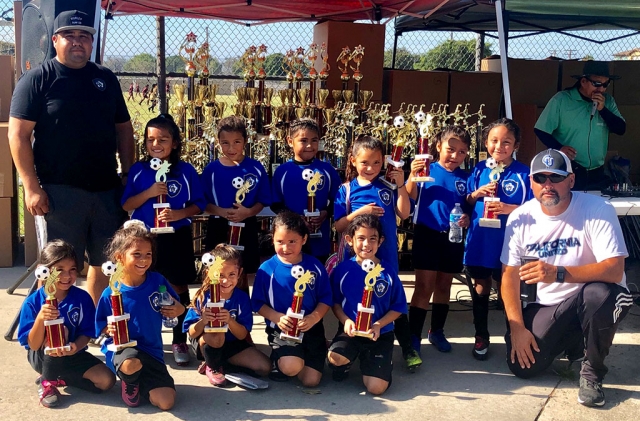 Pictures above is California United FC 2013 Girls Soccer Team Top left to right: Assistant Coach Jeremy Jimenez, Sadie Manriquez, Christine Beltran, Kenya Hernandez, Siani Lomeli, Annalise Castorena, Bella Mendez Bottom left to right: Marianah Arreola, Itzel Arana, Aixa Lomeli, Samantha Jimenez, Aaliyah Cervantez, and Head Coach Jr Lomeli. Photo courtesy Nancy Vaca.