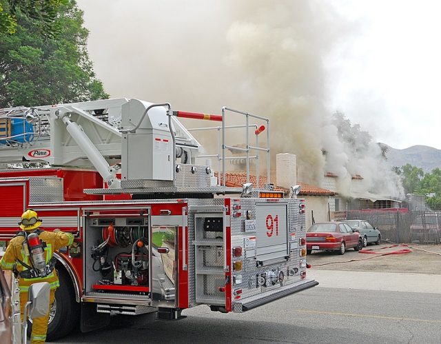 The fire, which started in the kitchen area, produced substantial smoke.