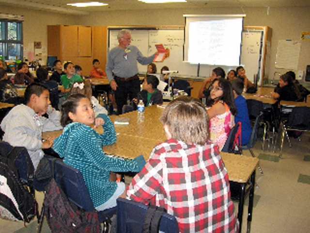 Dick Diaz visited Mountain Vista Elementary during the week of Veteran’s Day. He spoke with students in Mrs. Butts’s Language class about his own experiences in the Marines, and the tradition of military service in his family. He answered students’ questions and collected cards the students wrote to thank veterans for their service.