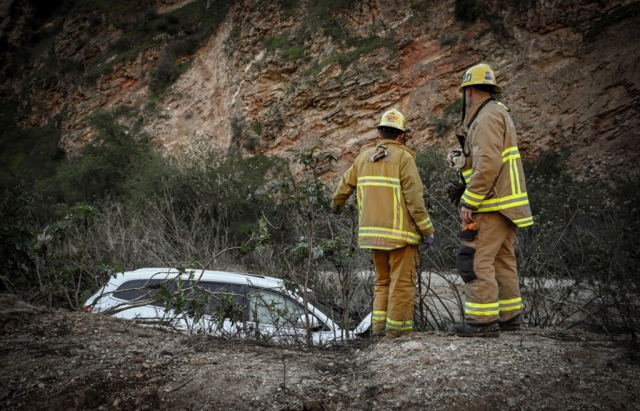 On Monday, February 6, at 3:30 p.m., the Ventura County Fire Department, AMR Paramedics, and California Highway Patrol were dispatched to a two-vehicle accident on SR23 at the Rock Quarry. Arriving CHP officer reported a vehicle blocking the southbound lane and a second vehicle down the embankment on the southbound side. Both lanes of SR23 were shut down for about 30 minutes, causing traffic to back up in both directions until the tow arrived to clear the scene. One patient was taken to Los Robles Hospital for chest pain. The crash is under investigation. Photo credit Gazette photographer Angel Esquivel-AE News.