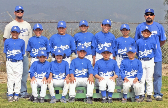 10 and Under Fillmore Dodgers came in first place here in the Fillmore Little League. The team was chosen to go to the play-offs where they battled against Santa Paula Blue Jays 11-5 in the championship play-offs game to take third place in Saticoy on June 20. Pictured above are Manager/Coach Aric Diaz, Coach Kevin Richardson, Michael Richardson, Darian Delgadillo, Jose Avila, Tatem Frosberg, Steven Juarez, Chris Castro, Aric Diaz, Anthony Aguilera, Joe Joe Vaca, Diego Garcia, Joey Zepeda, and Saul Santa Rosa. Not pictured in the
photo above is Coach Danny Aguilera. Si Se PUEDE!!!!! GO DODGERS!!!!!