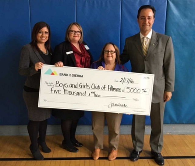 David Azma, Market President of Bank of the Sierra is shown presenting a check for $5,000 to Jan Marholin, CEO of the Boys & Girls Club of Santa Clara Valley. Also pictured are Jennie Andrade , Operations Manager and Alicia Hicks, Financial Services from Bank of the Sierra. The donation will be used for the new and soon to be Tom McGrath Teen Study Room at the Fillmore Site of the Boys & Girls Club. The room has been under construction for 14 months. The Club appreciates the generosity of Bank of the Sierra and looks forward to a long and productive partnership.