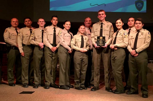 2015 Explorer of the Year Nicholas Bartels is pictured right of center with his plaque.