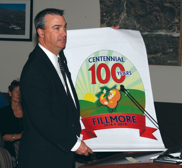 Fillmore’s City Manager David Rowlands displayed the 100 Year Centennial Celebration Banner at last week’s City Council meeting.