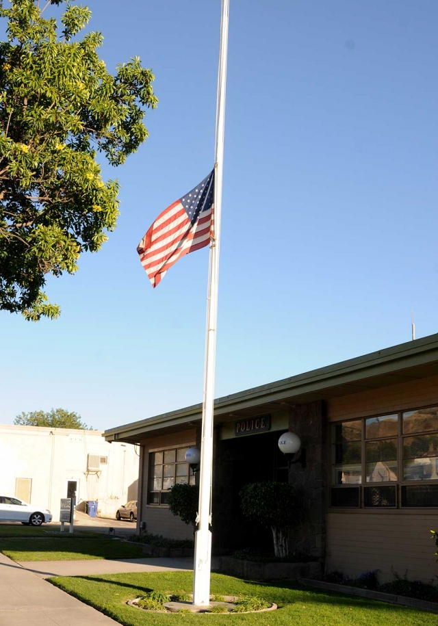 Old Glory, in front of the Fillmore Police Station, flies at half-mast in honor of the 17 victims of the shooting at Stoneman Douglas High School in Parkland, Florida. The school shooting is one of the deadliest in modern American history.