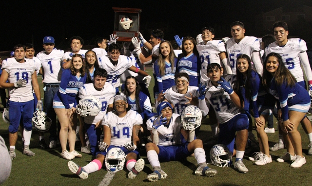 On Friday, October 22nd, the Fillmore Flashes played and defeated longtime rival Santa Paula 57 to 7 for the 110th meeting of the teams. Above are the Flashes celebrating after the big victory and hoisting the famous Leather Helmet which will be returning to Fillmore. The Flashes overall record is now 6-3, and 2-2 for League. Photos courtesy Crystal Gurrola.