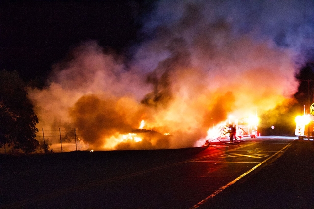 On Saturday March 27th, at 11:09pm, Ventura County Fire Department, Fillmore Fire and California Highway Patrol were dispatched to a vehicle fire located at Seventh Street and Old Telegraph Road, Fillmore. Arriving fire crews reported a flatbed trailer with no semi attached fully engulfed in flames, with oranges and lemons trees also on fire in a nearby orchard. Fire crews requested CHP for road closer. Fire Crews quickly extinguished the fire. Cause of the fire is under investigation: it has been reported by VCSD as arson. Photos courtesy Angel Esquivel—AE News.