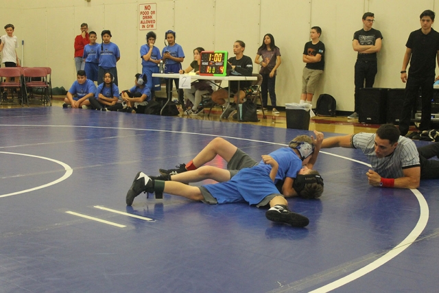 Pictured above is James Zellmer taking his opponent to the mat in his match at Balboa Middle School last week, James finished with a record 1-0. Last week the Fillmore Middle School Bulldogs Wrestling Team competed at Balboa Middle School in Ventura, the results are as follows: Devin Camacho 0-1, Erik Castaneda 0-1, Jonathan Patino 1-0, James Zellmer 1-0, Delilah Cervantez 0-1, Natalia Herrera 1-0, Amalia Nolan 1-0 (pin), Emma Torres 1-0 (pin). The team competed against athletes representing Balboa, Isbell, and Sinaloa middle schools. The team will next compete at Isbell Middle School. [Story and photos courtesy Coach Michael Torres]
