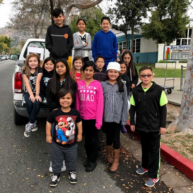 (above) ASB students standing by the truck with all the food collected for the Giving Food Drive. The Students of San Cayetano brought in over 500 cans of food and many other nonperishable food items for the hungry of Ventura County. The Spirit of Giving food drive ran from Nov. 29th through Dec. 15th. The top three
classes to collect the most food were Mrs. Dollar - Kindergarten, Miss Fang - 2nd grade and Mr., White 3rd grade. One of the goals at San Cayetano School is for our student to experience opportunities to give back to the community and do for others. We are very proud of our generous students and families of San Cayetano School. Story and Photo by Tricia Gradias, Principal, San Cayetano School.