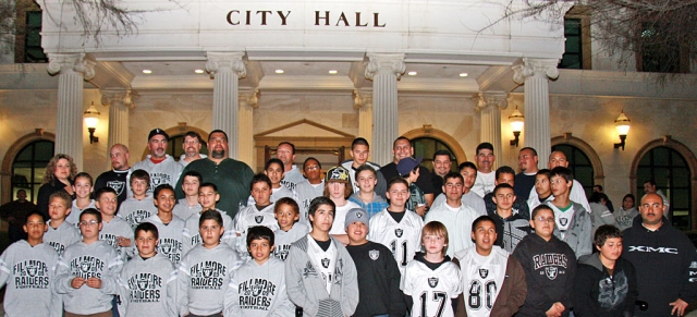 Fillmore Raiders Football players were honored for their championship season at Tuesday night’s council meeting. Photo by Harold Cronin.