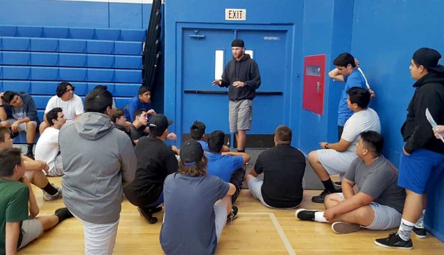 New FHS Head Football Coach Corey Cole addressed the football weightlifting class for the first time as their coach. He spoke of hard work, making football fun again, and a new offense and defense.