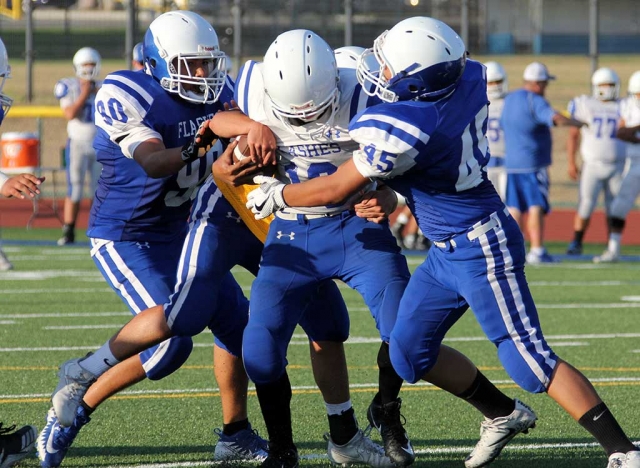 The Fillmore Flashes are preparing for the 2017 Football season. They were seen scrimmaging this past Saturday, August 12th against each other. For the past two months the team has been adjusting to the new playbook for both offence and defense. They will host scrimmage against Oak Park and Trinity Classical Friday, August 18th at 4:30pm. Season will begin September 1st at Channel Islands High School. Football photos courtesy Crystal Gurrola.