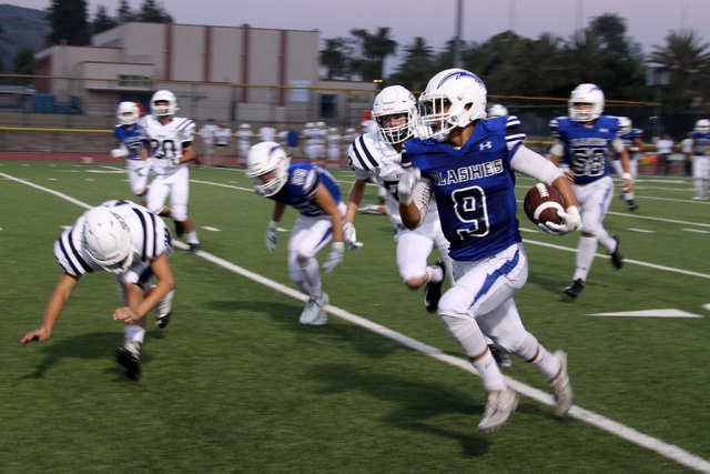 (above) Fillmore Flashes #9 Ricky Calderon as he leaves the Patriots in dust as he carries the up the field in Friday night’s game. Submitted by Head Coach Sean Miller: Last Friday night, the Fillmore Flashes beat the Viewpoint Patriots 49-22 in their opening game of the season to start out the year with a record of 1-0. Senior quarterback Jake Saviers threw for 283 yards and 3 touchdowns while completing 15 of 17 passes. He also ran in another 2 touchdowns. Junior Bryce Nunez also had a strong game, rushing for 189 yards and 2 touchdowns. The Flashes defense was led by junior middle linebacker David Tovar and featured strong performances from senior Trevor Scott and sophomores Ty Wyand and Nick Jimenez who had 2 sacks. Next game up for the Flashes is away vs. Brentwood this Friday, 8/24, at 7pm. Photos courtesy Crystal Gurrola.