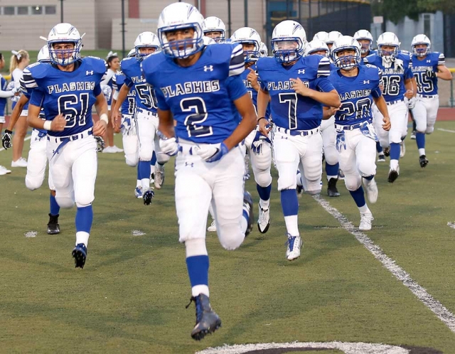 Friday August 26th The Fillmore Flashes kicked off the season playing against Eagle Rock. Highlights from the game: Hector Sanchez was 10 of 18 for 106 yards, one touchdown pass and one rushing touchdown and Kevin Galvan had 11 tackles. Final Score Eagle Rock 19 - Flashes 13. Over all Coach Dollar had this to say about last Friday’s game, “As a team we played hard, but 4 turnovers cost us the game.” This Friday September 2nd is at Home, Flashes take on Channel Islands High School J.V. game starts at 4:30pm, Varsity game starts at 7:30pm. [Photos by Crystal Gurolla and Charles Morris]