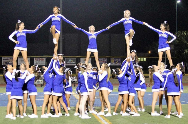 Fillmore Varsity Cheerleaders half-time routine gets the crowd pumped up for the second half.